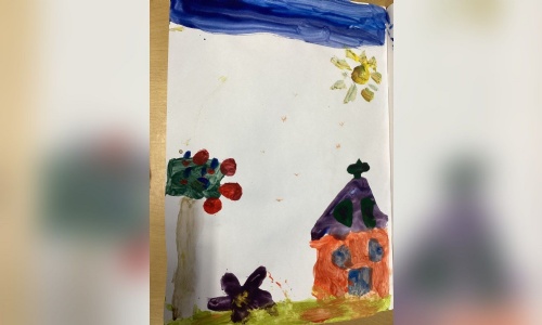 A garden scene painted with primary and secondary colours