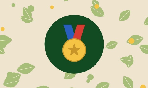 Gold medal icon on a cream background